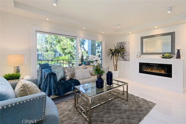 100 Scholz Plz Unit 205, Newport Beach, CA 92663 - living area with recessed lighting, a glass covered fireplace, and a raised ceiling