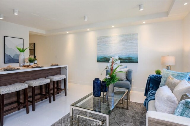 100 Scholz Plz Unit 205, Newport Beach, CA 92663 - living area with recessed lighting and light tile patterned floors