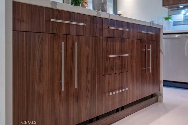 100 Scholz Plz Unit 205, Newport Beach, CA 92663 - kitchen view of stainless steel dishwasher, modern cabinets, and light countertops