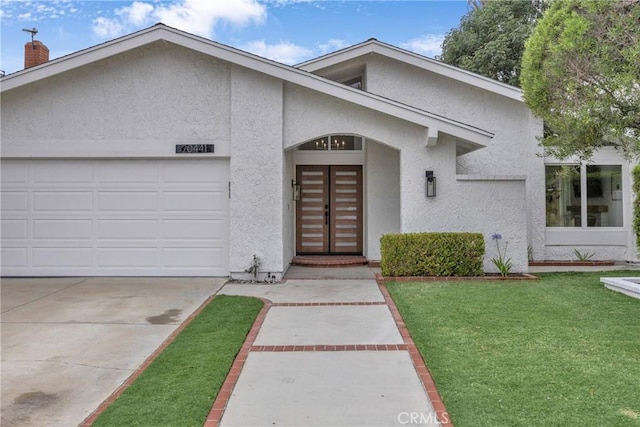 20441 Whitetree Cir, Huntington Beach, CA 92646 - view of front facade with stucco siding, an attached garage, a front yard, driveway, and a chimney