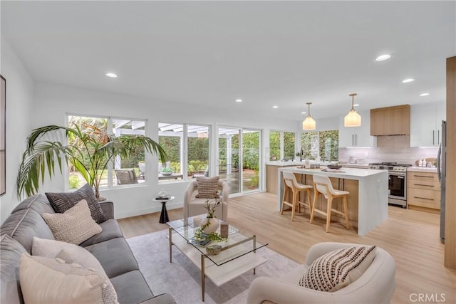 20441 Whitetree Cir, Huntington Beach, CA 92646 - living area with recessed lighting and light wood-type flooring