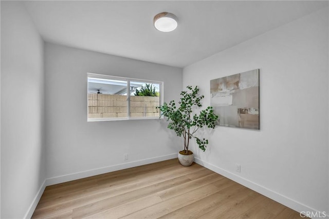 20441 Whitetree Cir, Huntington Beach, CA 92646 - unfurnished room featuring baseboards and wood finished floors