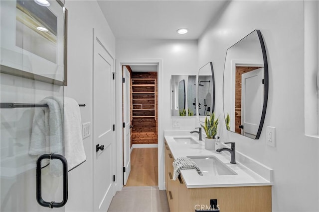 20441 Whitetree Cir, Huntington Beach, CA 92646 - full bathroom with double vanity, a shower stall, and wood finished floors