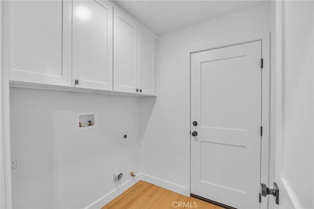 20441 Whitetree Cir, Huntington Beach, CA 92646 - laundry room with cabinet space, electric dryer hookup, washer hookup, and light wood-type flooring