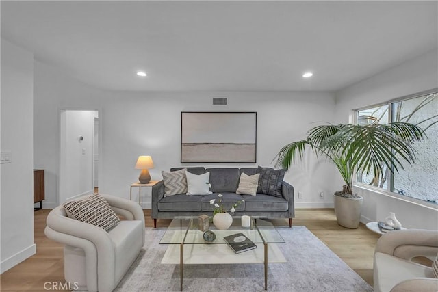 20441 Whitetree Cir, Huntington Beach, CA 92646 - living room featuring wood finished floors and recessed lighting