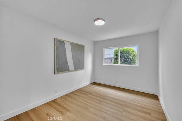20441 Whitetree Cir, Huntington Beach, CA 92646 - spare room with light wood-type flooring and baseboards