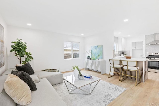 1320 Higgins, Oceanside, CA 92058 - living area featuring light wood-style flooring and recessed lighting