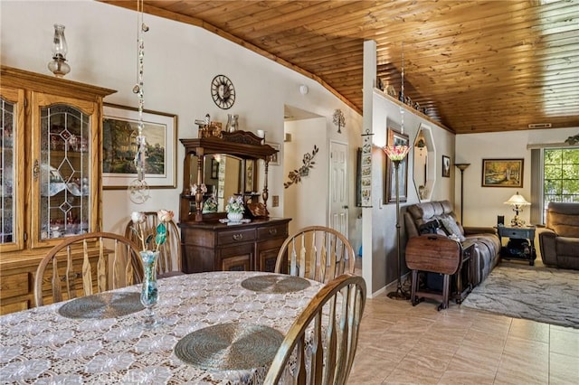 7050 Shale Rock Rd, Paso Robles, CA 93446 - dining room featuring light tile patterned floors, wood ceiling, and vaulted ceiling