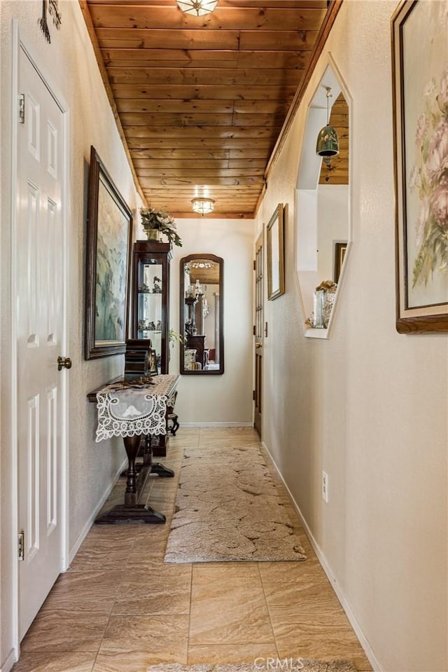 7050 Shale Rock Rd, Paso Robles, CA 93446 - hallway with wooden ceiling, tile patterned floors, and arched walkways