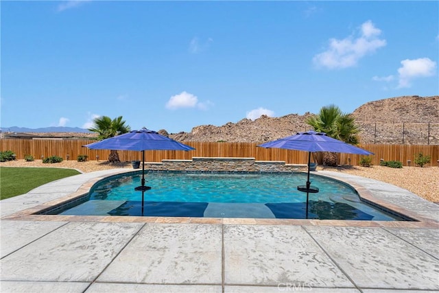 15558 Lookout Rd, Apple Valley, CA 92307 - view of pool with a fenced backyard, a patio, and a mountain view