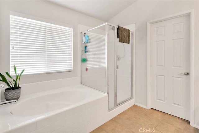 15558 Lookout Rd, Apple Valley, CA 92307 - full bathroom with a stall shower, a garden tub, and tile patterned floors