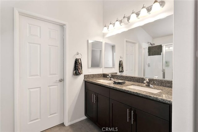 15558 Lookout Rd, Apple Valley, CA 92307 - bathroom featuring double vanity, a stall shower, and tile patterned floors
