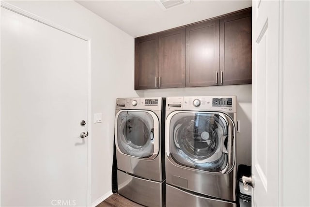 15558 Lookout Rd, Apple Valley, CA 92307 - laundry room featuring cabinet space and washer and dryer