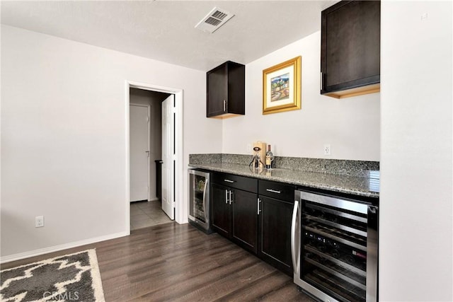 15558 Lookout Rd, Apple Valley, CA 92307 - indoor wet bar featuring beverage cooler and dark wood-type flooring