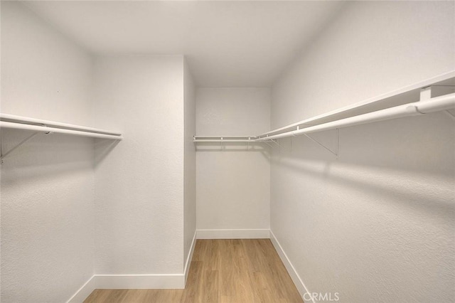 1207 Porto Grande Unit 1, Diamond Bar, CA 91765 - spacious closet with light wood-style flooring