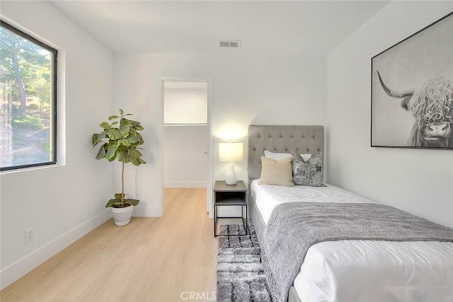 1207 Porto Grande Unit 1, Diamond Bar, CA 91765 - bedroom with wood finished floors and baseboards