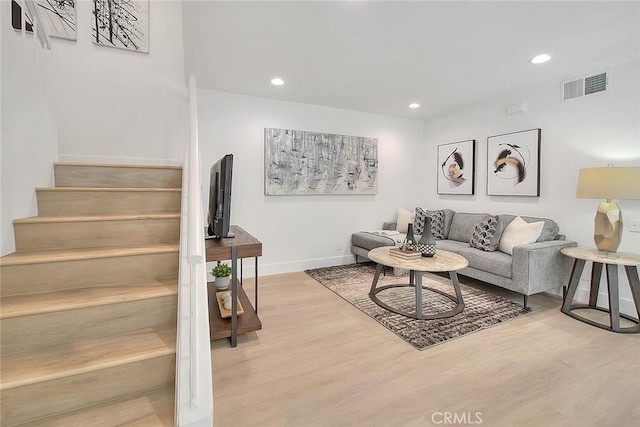 1207 Porto Grande Unit 1, Diamond Bar, CA 91765 - living room with wood finished floors, recessed lighting, and stairs