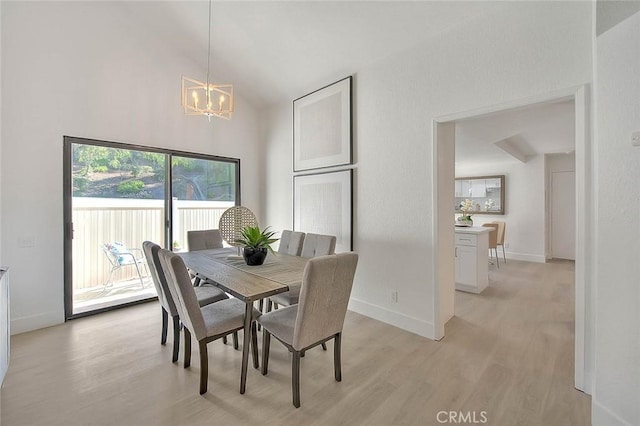 1207 Porto Grande Unit 1, Diamond Bar, CA 91765 - dining room featuring a chandelier, light wood-type flooring, and high vaulted ceiling