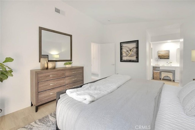 1207 Porto Grande Unit 1, Diamond Bar, CA 91765 - bedroom with light wood-style floors and ensuite bathroom