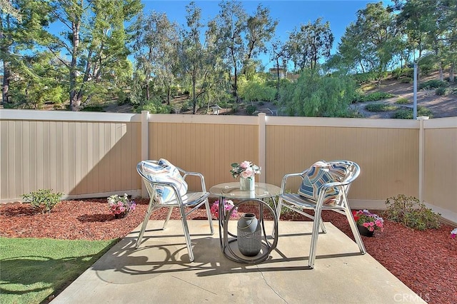 1207 Porto Grande Unit 1, Diamond Bar, CA 91765 - fenced backyard with a patio and view of scattered trees