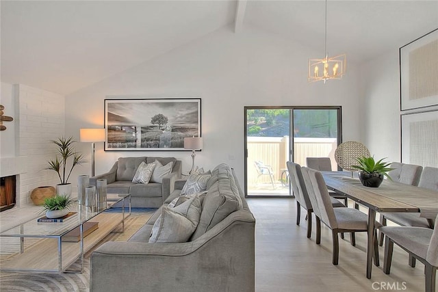 1207 Porto Grande Unit 1, Diamond Bar, CA 91765 - living room featuring a chandelier, beamed ceiling, light wood finished floors, and high vaulted ceiling