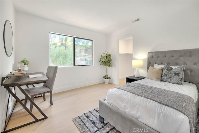 1207 Porto Grande Unit 1, Diamond Bar, CA 91765 - bedroom featuring light wood-type flooring and baseboards