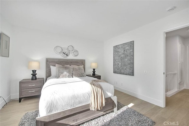1207 Porto Grande Unit 1, Diamond Bar, CA 91765 - bedroom with light wood-style flooring and baseboards