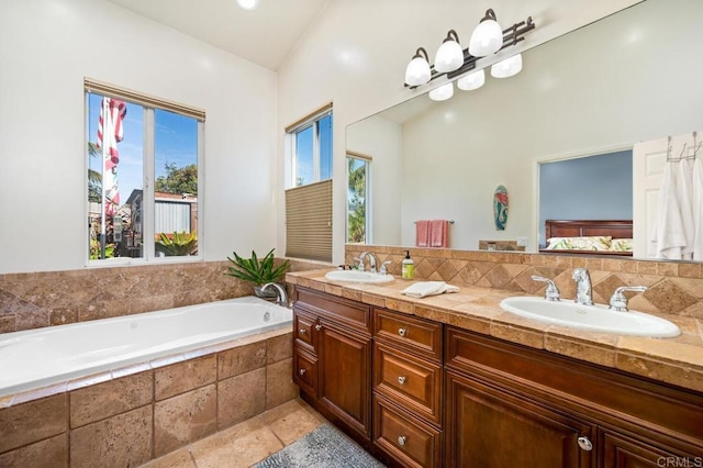 2722 Penkea Dr, Oceanside, CA 92054 - full bathroom featuring healthy amount of natural light, double vanity, and a bath