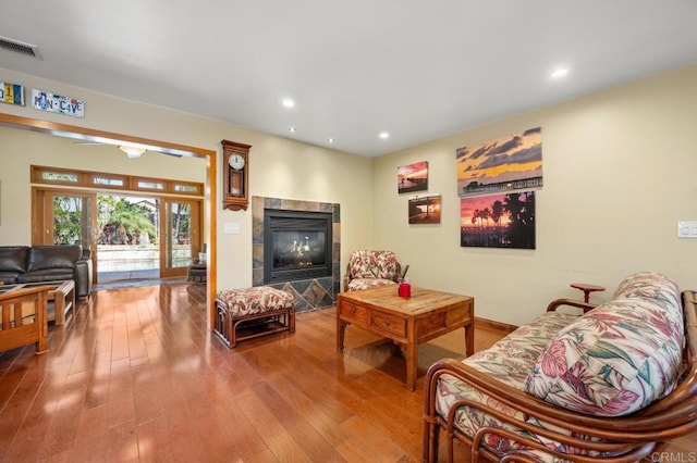 2722 Penkea Dr, Oceanside, CA 92054 - living room featuring hardwood / wood-style floors, a tile fireplace, and recessed lighting