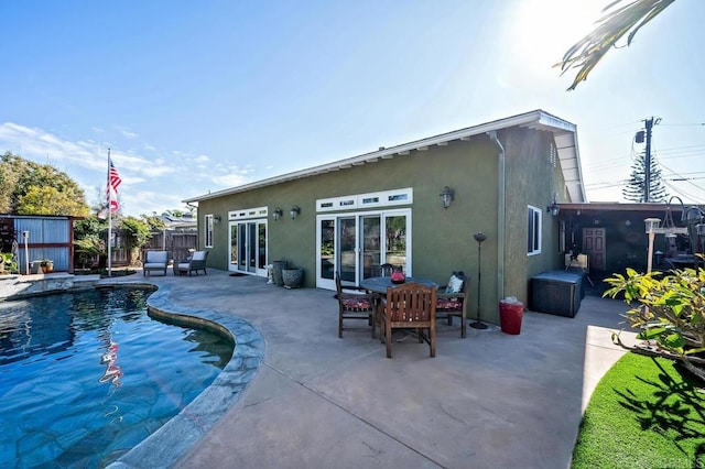 2722 Penkea Dr, Oceanside, CA 92054 - rear view of house featuring stucco siding, french doors, and a patio