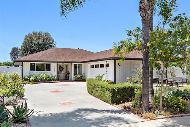 30361 Via Alcazar Ave, Laguna Niguel, CA 92677 - view of front of house featuring a garage, a shingled roof, and driveway