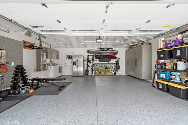 30361 Via Alcazar Ave, Laguna Niguel, CA 92677 - garage with separate washer and dryer, stainless steel fridge with ice dispenser, and strapped water heater