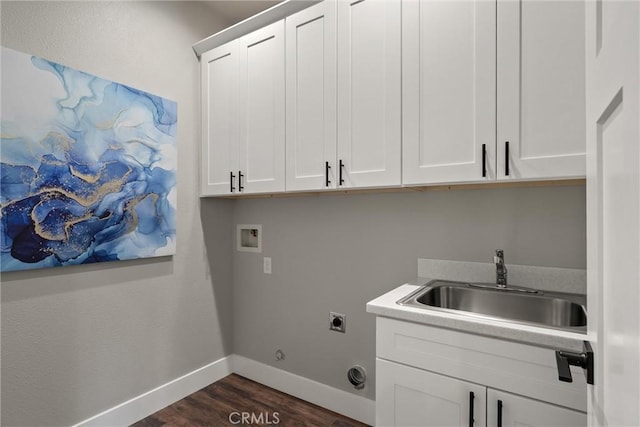 6169 Fern Ln, Paradise, CA 95969 - washroom featuring electric dryer hookup, cabinet space, dark wood-style flooring, and washer hookup