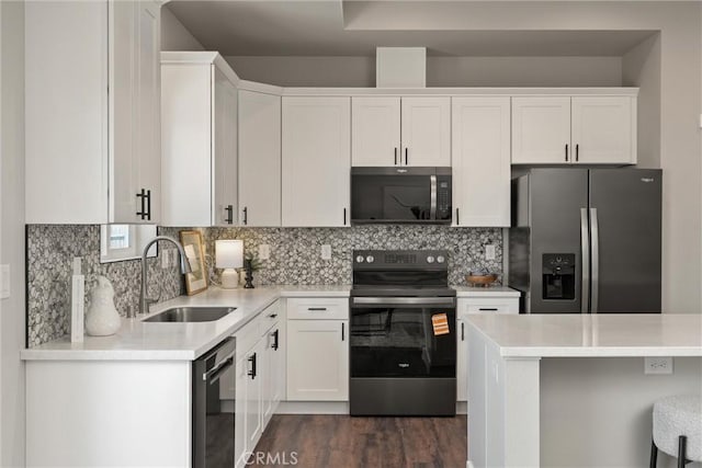 6169 Fern Ln, Paradise, CA 95969 - kitchen with black electric range oven, stainless steel refrigerator with ice dispenser, dishwasher, and light countertops