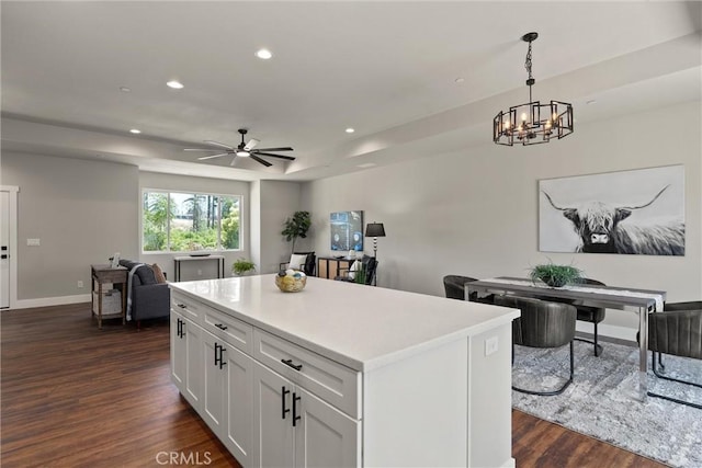 6169 Fern Ln, Paradise, CA 95969 - kitchen with dark wood-style floors, open floor plan, white cabinetry, recessed lighting, and a center island