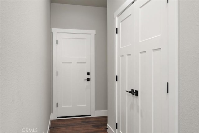 6169 Fern Ln, Paradise, CA 95969 - doorway featuring dark wood-style floors and baseboards