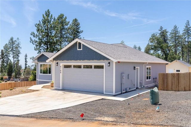 6169 Fern Ln, Paradise, CA 95969 - ranch-style house with an attached garage, concrete driveway, and a shingled roof