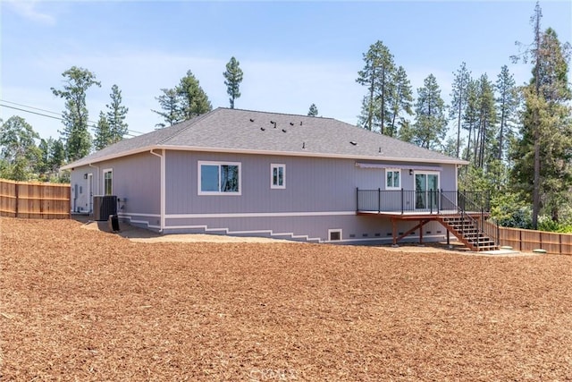 6169 Fern Ln, Paradise, CA 95969 - back of house with stairs, a deck, and a fenced backyard