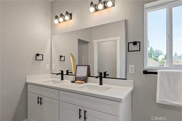 6169 Fern Ln, Paradise, CA 95969 - bathroom with double vanity and a textured wall