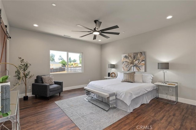 6169 Fern Ln, Paradise, CA 95969 - bedroom featuring a barn door, recessed lighting, wood finished floors, and a ceiling fan