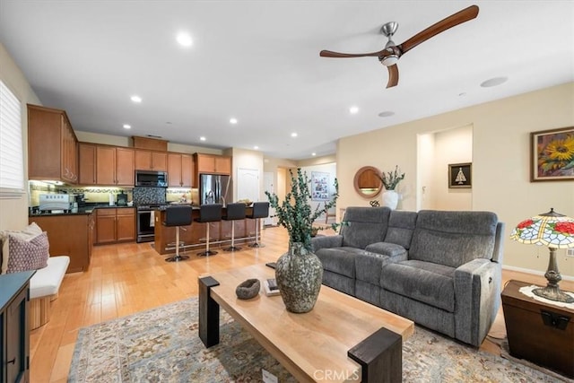 1061 Ford Dr, Nipomo, CA 93444 - living area featuring ceiling fan, light wood-style flooring, and recessed lighting