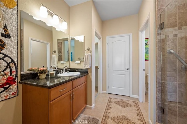 1061 Ford Dr, Nipomo, CA 93444 - bathroom featuring vanity, a stall shower, and tile patterned floors