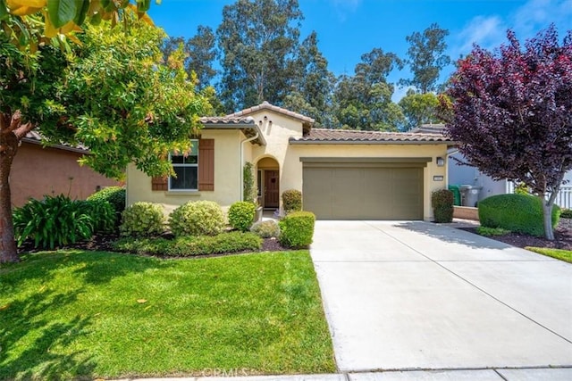 1061 Ford Dr, Nipomo, CA 93444 - mediterranean / spanish home featuring stucco siding, driveway, a garage, a front lawn, and a tiled roof