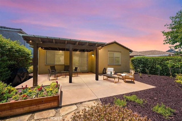 1061 Ford Dr, Nipomo, CA 93444 - back of house with an outdoor hangout area, a patio, and stucco siding