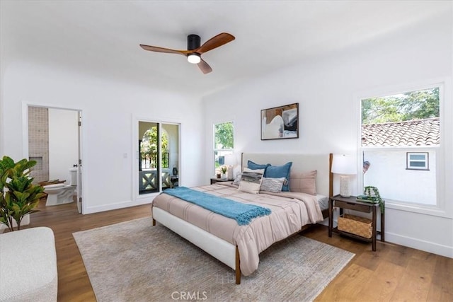 4325 9th Ave, Los Angeles, CA 90008 - bedroom with multiple windows, light wood-style floors, ceiling fan, and access to exterior