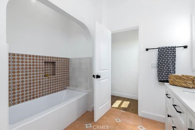 4325 9th Ave, Los Angeles, CA 90008 - bathroom featuring vanity, tile patterned flooring, and a bath