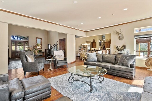 858 Fox Tower Way, Big Bear Lake, CA 92314 - living area with stairway, ornamental molding, hardwood / wood-style flooring, and recessed lighting