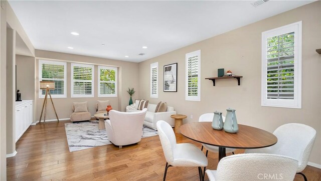 66 Full Moon, Irvine, CA 92618 - dining area featuring light wood-style floors, plenty of natural light, and recessed lighting