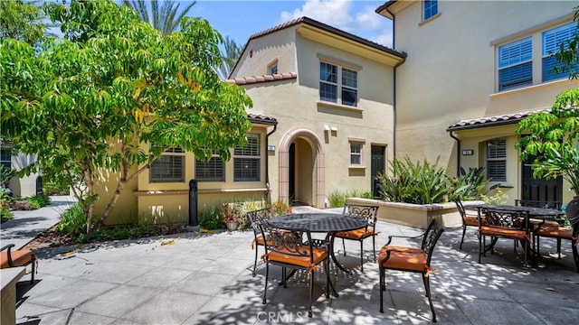 66 Full Moon, Irvine, CA 92618 - view of patio featuring outdoor dining area