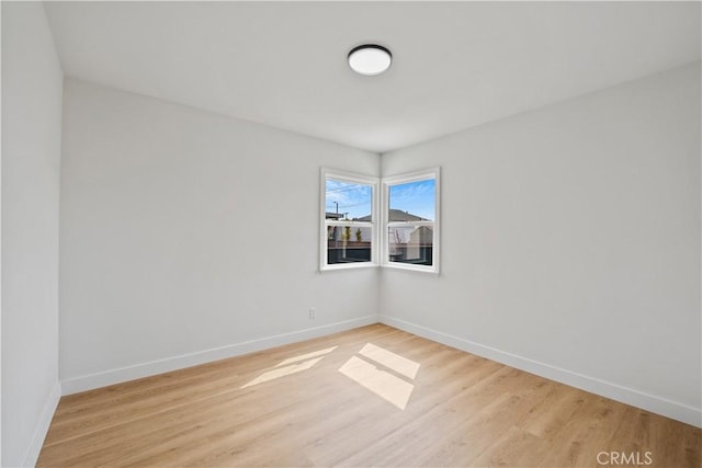 7312 Loch Alene Ave, Pico Rivera, CA 90660 - spare room featuring light wood finished floors and baseboards
